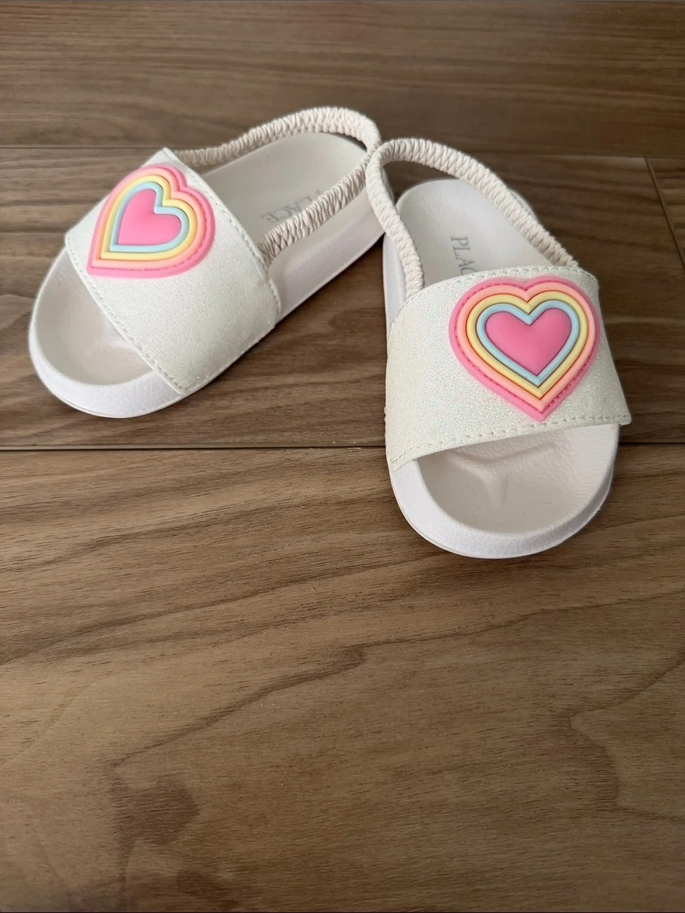 The Children's Place White Slide Sandals with Pink Rainbow Heart Accent